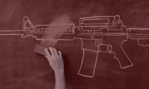 hand-erasing-gun-from-blackboard_Red filter